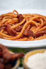 Cooked Beef Cheeks On Pasta, Cheese And Tomato Sauce