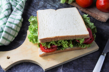 sandwich with ham and vegetables
