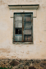 Fototapeta na wymiar old window in a ruined manor