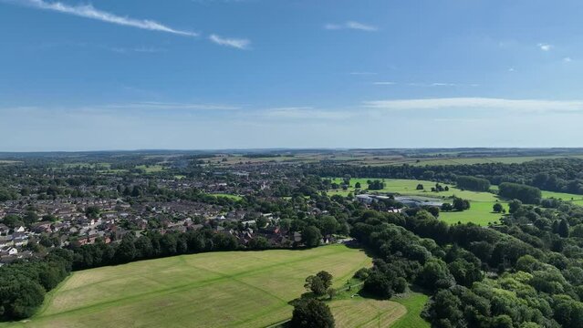short aerial video clip flying over fields towards Blandford in Dorset uk