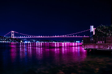 Bosphorus Bridge with its pink lights at night. Istanbul at night.