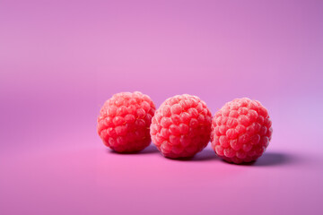 Raspberry fruit on a solid color background. Isolated object in photo studio. Commercial shot with copyspace.