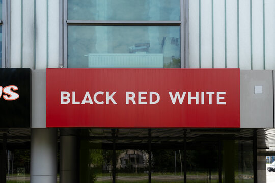 Black Red White furniture store building with brand logo sign. Polish furniture manufacturer. BRW salon shop signboard with brand logotype on August 12, 2023 in Krakow, Poland.