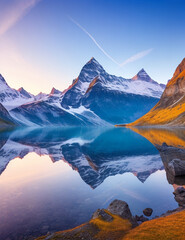 Fantastic evening panorama of Bachalp lake / Bachalpsee, Switzerland. Picturesque autumn sunset in Swiss alps, Grindelwald, Bernese Oberland, Europe. Beauty of nature concept background.
 - obrazy, fototapety, plakaty