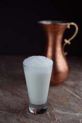 Special dairy buttermilk in a glass
isolated black background