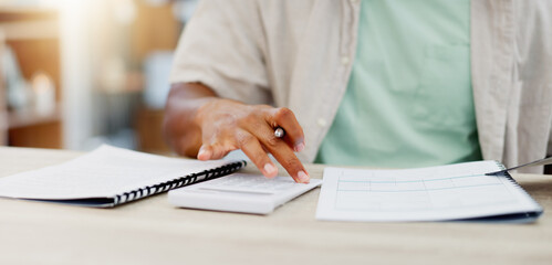 Budget, paperwork and calculator with man hands writing for accounting, debt review and tax...