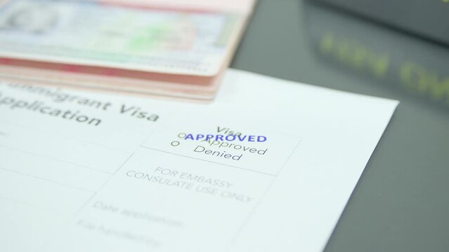 Close up visa application paper and stamp approved
