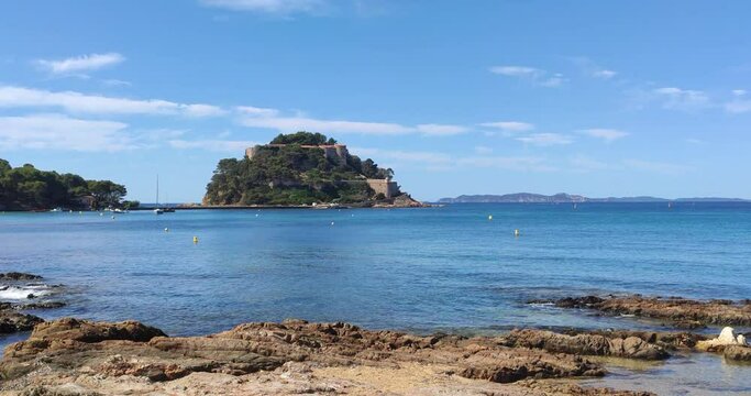 View of Br&eacute;gan&ccedil;on bay from "Pointe du diable" (Devil point) in Bormes-les-mimosas, sunny day, calm waters