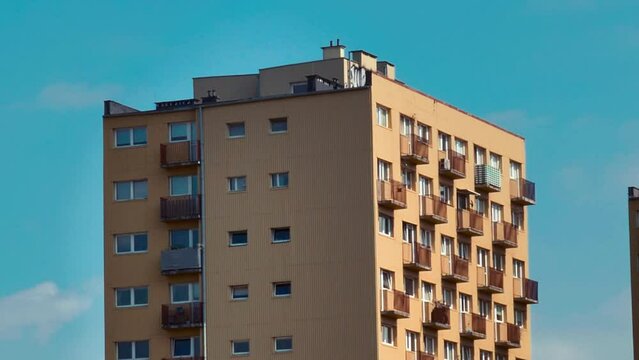 Living building in 1980s PRL socialism style on blue sky background, Wroclaw, Poland