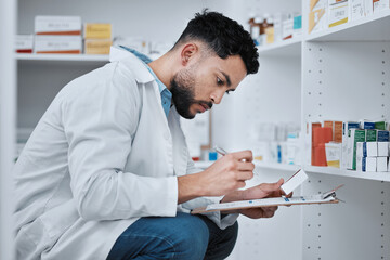 Man, pharmacist and clipboard for inventory inspection on shelf in checking stock, medication or pills at pharmacy. Male person, medical or healthcare employee and checklist on pharmaceutical product