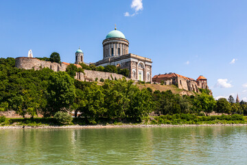 Fototapeta na wymiar View of the Esztergom Basilica at the Castle Hill from the opposite bank of Danube, Hungary. The Latin motto on the temple frieze reads: Seek those things which are above. It's a World Heritage Site.