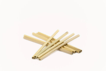 Eco-friendly bamboo drinking straws, a sustainable alternative to plastic, showcased against a clean white background. 'no to plastic' concept, offering copy space for your message.