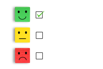 Emotion face symbol on Green, yellow and red wooden blocks, Consumers Show Satisfaction Rating concept by evaluating business success. Services and products and Customer Engagement, Quality Assessment