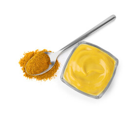 Tasty curry sauce and powder isolated on white, top view