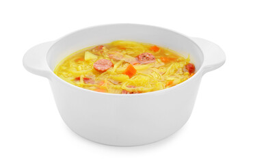 Bowl of delicious sauerkraut soup with smoked sausages isolated on white