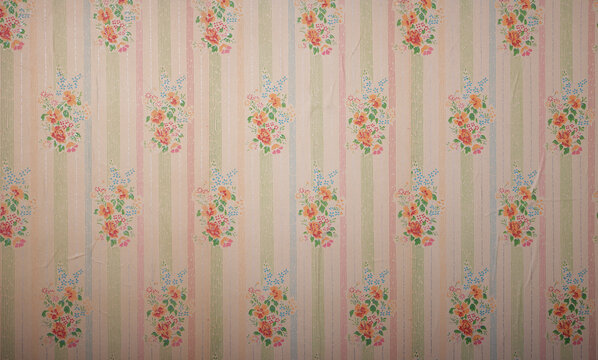 Fototapeta Old wallpaper on the wall. Old wallpaper for texture or background.
