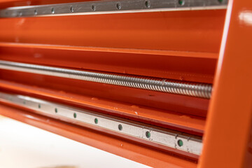 Orange CNC machine, ball screw and pallid metal guides