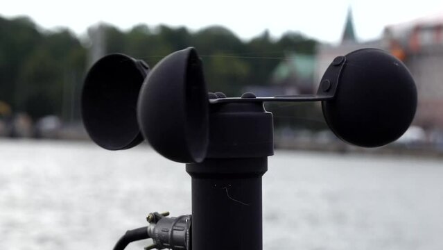 Helsinki, Finland, An anemometer in the harbor spins with the wind to measure wind speed. 