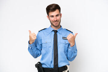 Young police caucasian man isolated on white background with thumbs up gesture and smiling