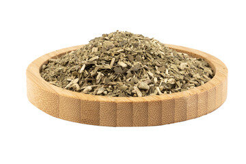 dried mate tea in a wooden bowl
