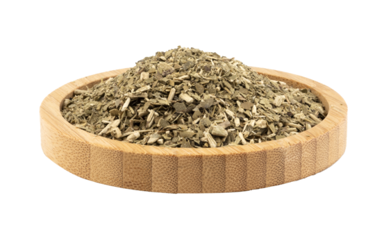 dried mate tea in a wooden bowl