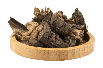 dried udu hindi root in a wooden bowl