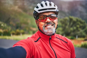 Zelfklevend Fotobehang Happy man, cyclist and portrait in selfie on mountain bicycle for photograph, picture or outdoor memory in nature. Male person or athlete smile in photo, happiness or cycling in fitness or travel © peopleimages.com