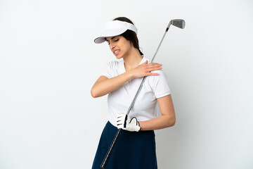 Handsome young golfer player woman isolated on white background suffering from pain in shoulder for having made an effort
