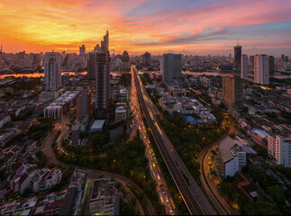 Naklejka na ściany i meble Aerial view of Bangkok skyline and skyscraper Bangkok cityscape. Bangkok night view in the business district