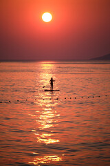 Sup at sunset in Baska Voda, Croatian coast