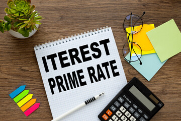 Paper with sign PREMIER INTEREST RATE. bright stickers and potted plants