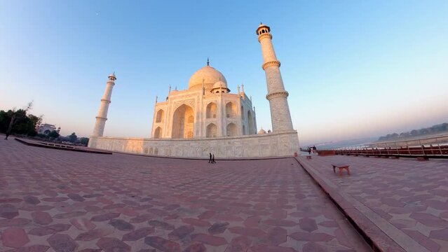 Motion timelapse view of the Taj Mahal at sunrise in Agra, India. 