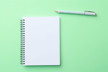 note, pen on green background
