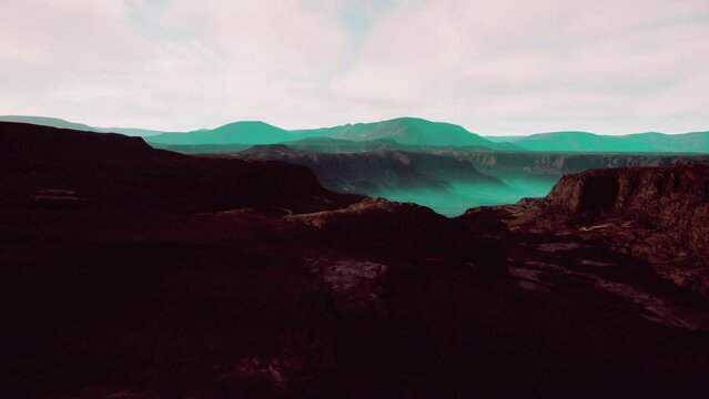 black volcanic basalt rock formations in the low light
