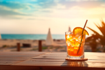 Alcoholic cocktail on the background of a beautiful beach and free space for text. Summer alcoholic drink