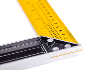 Yellow and black Metal construction square triangle ruler isolated on white
