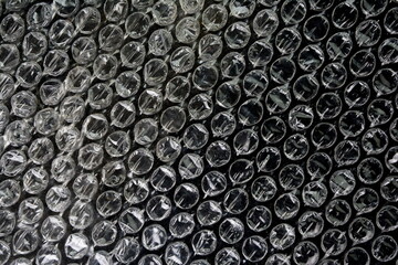 Black bubble plastic wrap surface. plastic with air balls on the surface used to pack glassware or electronics or sensitive items
