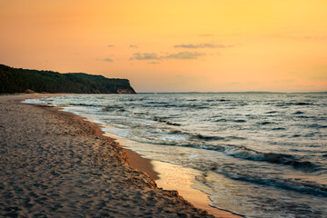 Sunset on the Baltic Sea in Poland. Landscape of Baltic sea shore. Zachód słońca nad Morzem Bałtyckim w Polsce. Krajobraz brzegu Morza Bałtyckiego.