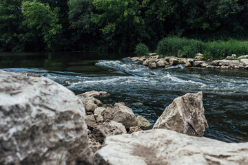 Summer mountain river view, mountain river, rocky shore, fast river