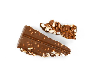 Chunks of milk chocolate with puffed rice isolated on white background. Rice chocolate studio isolated. 