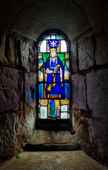 Stained glass window showing Saint Margaret of Scotland, from her chapel in Edinburgh Castle