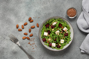 Beetroot salad on a gray concrete background. Top view, flat lay, copy space.