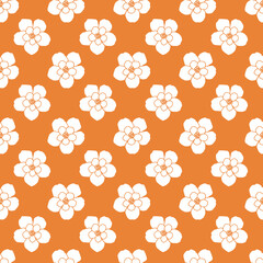 Seamless pattern with white flower on orange background
