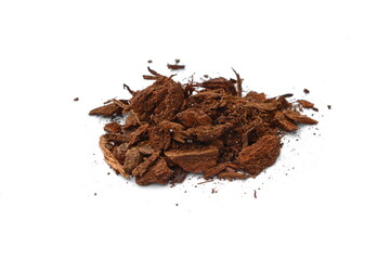 High Angle Close Up Detail of a Pile of Aged Pine Bark and Coconut Fiber Soil Isolated on White Background. Orchid soil, made of pine tree bark. White background and isolated tree pieces.