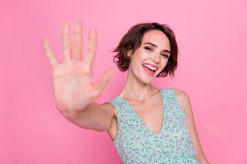 Photo of cheerful nice lady toothy smile good mood arm palm give high five you isolated on pink color background