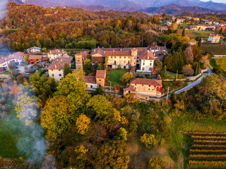 Autumnal magic and emotions on the ancient village. Between vineyards and colorful woods. Friuli....
