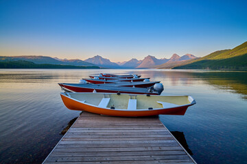 Boats on a dock at Lake McDonald, Glacier National Park, MT.