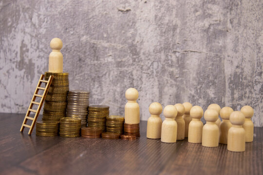 Concept for property ladder, mortgage and real estate investment. house model and miniature businessman on coins stack