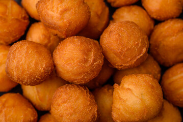 Delicious fried potato balls with breaded mozzarella, salt, spices and herbs