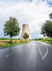 Green landscape and nuclear power plant.